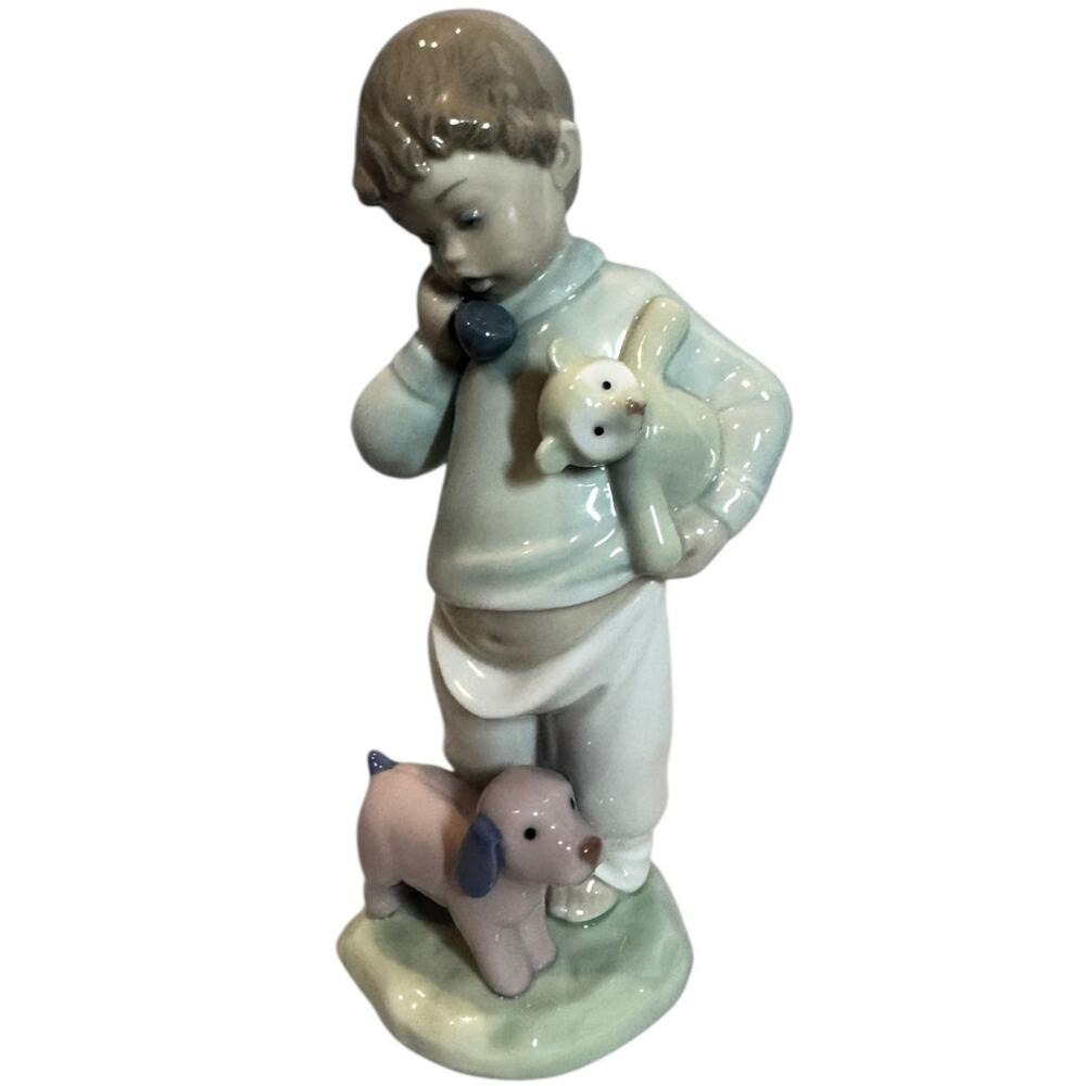 llardo Nao "Boy on Phone with Puppets"‎ porcelain figurine, Boy Nursery